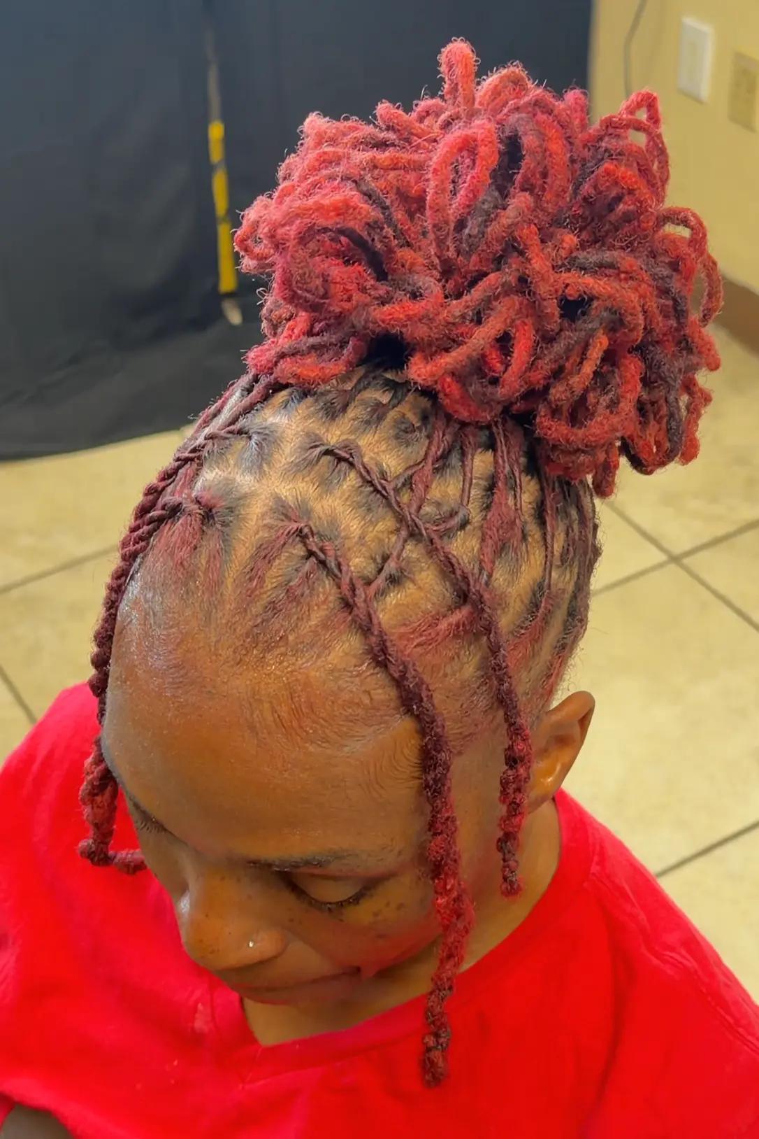 Loc styling work by Madi Locs